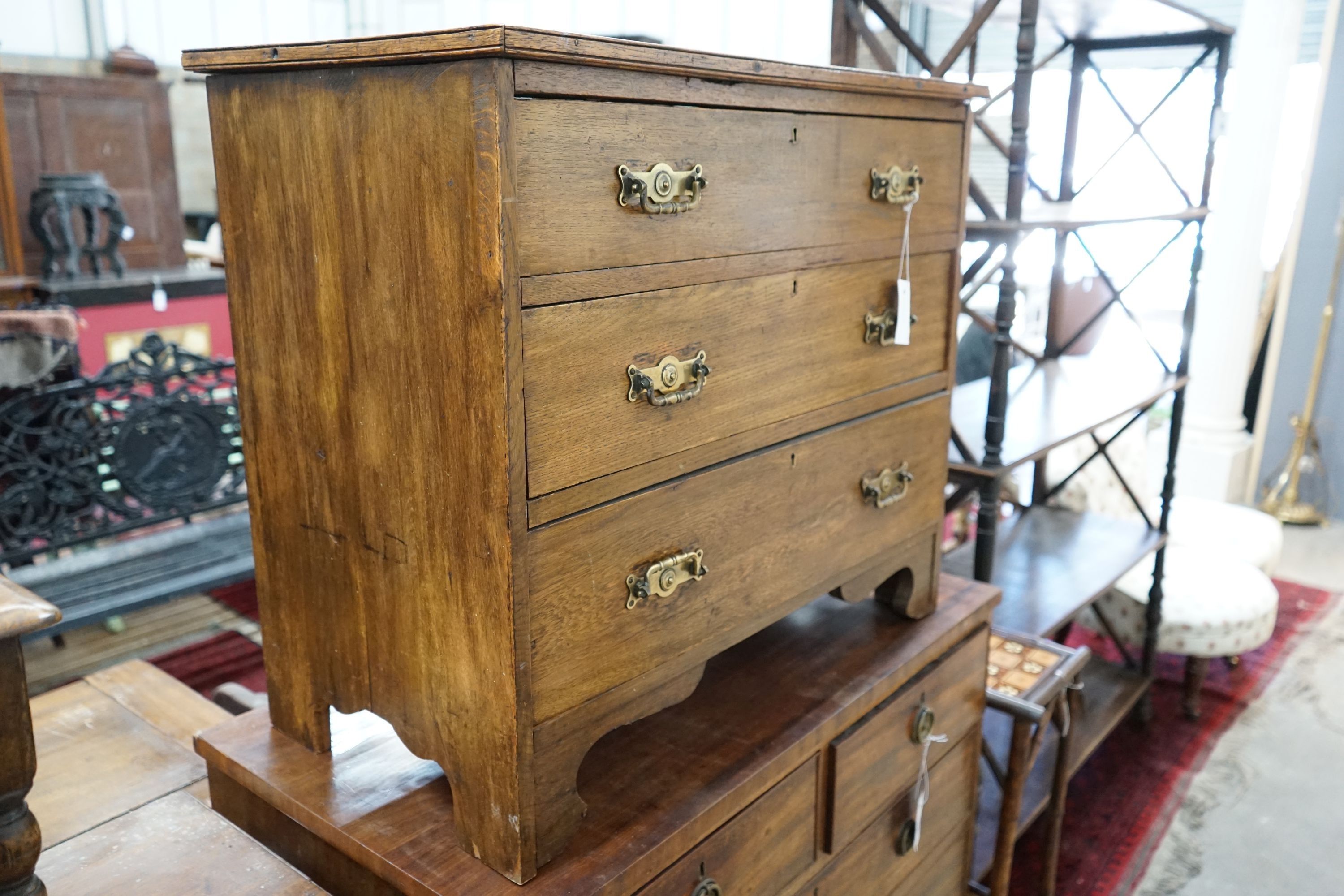 An early 20th century oak three drawer chest, width 77cm, depth 43cm, height 67cm together with an 18th century style oak joint stool